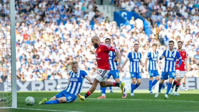 Bryan Mbuemo of Manchester United scores their second goal d