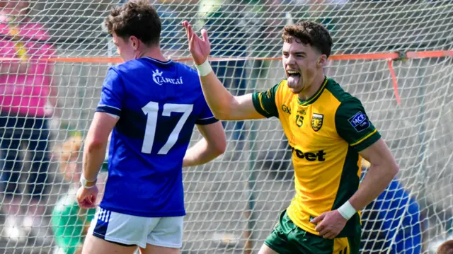Shea Malone celebrates scoring a goal