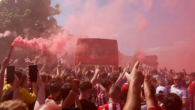 Flares being let off as Sunderland's team bus arrives