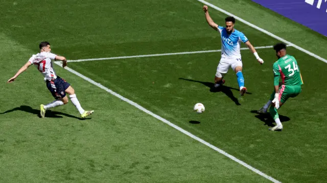 Ruben Rodrigues slots the ball in