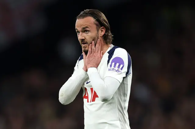 James Maddison holds his hands to his face
