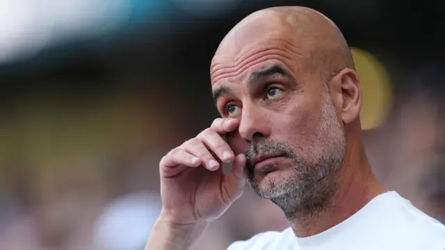 Guardiola wipes a tear from his eye