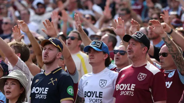 Fans of West Ham United look on