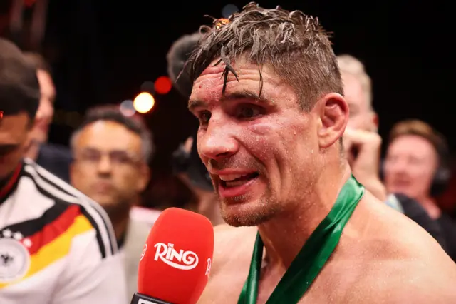 Rico Verhoeven speaks in the ring