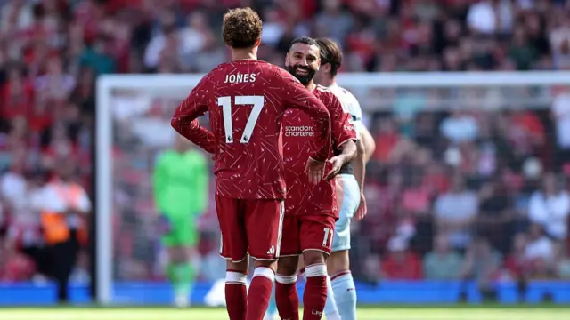 Curtis Jones and Mohamed Salah celebrate