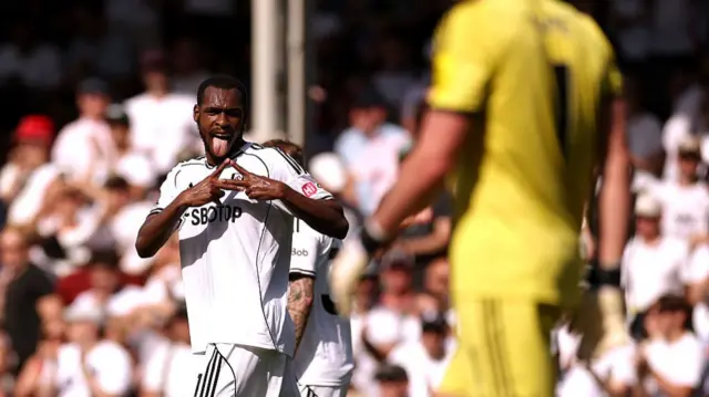 Issa Diop of Fulham celebrates scoring his team's first goal