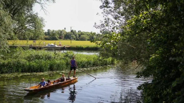 Punters on the River Great Ouse as temperatures climb over the bank holiday weekend