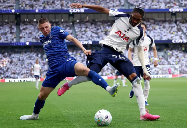 Vitaliy Mykolenko of Everton battles for possession with Djed Spence of Tottenham Hotspur