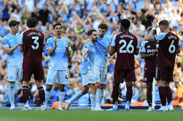 Bernardo Silva in tears as he makes his way off through a guard of honour