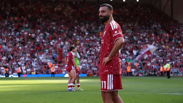 Mohamed Salah in tears on the pitch
