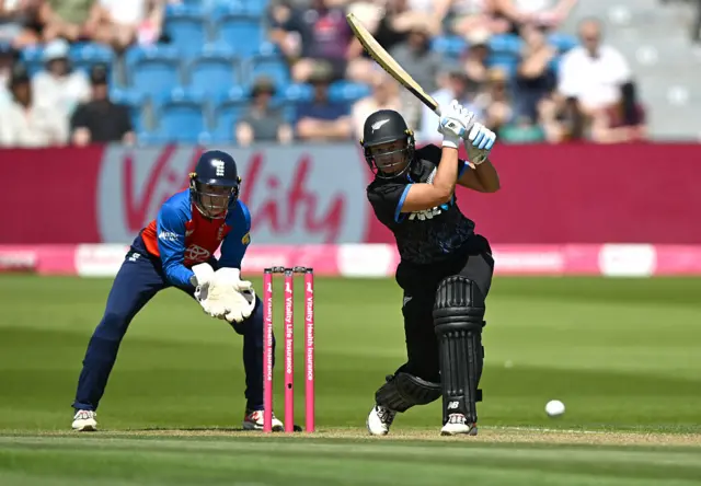 England wicketkeeper Amy Jones looks on as New Zealand batter Suzie Bates hits out during the 3rd Women's Vitality IT20 match between England and New Zealand at County Ground