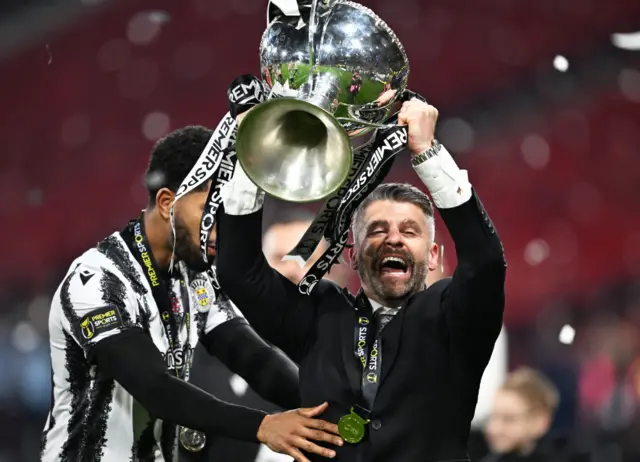 Stephen Robinson lifts trophy