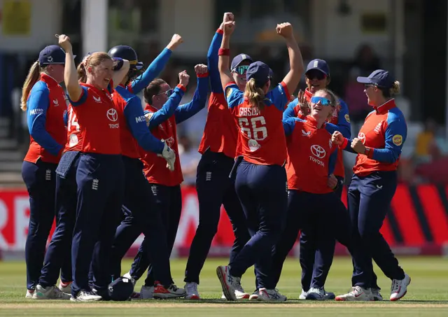 Charlie Dean and England celebrate a successful review