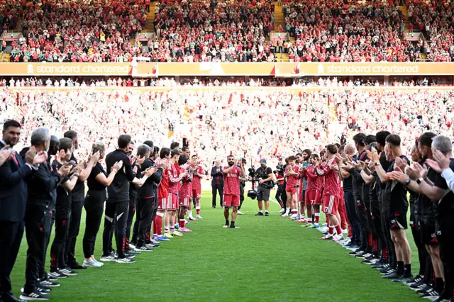 Mohamed Salah is afforded a guard of honour by his Liverpool team-mates