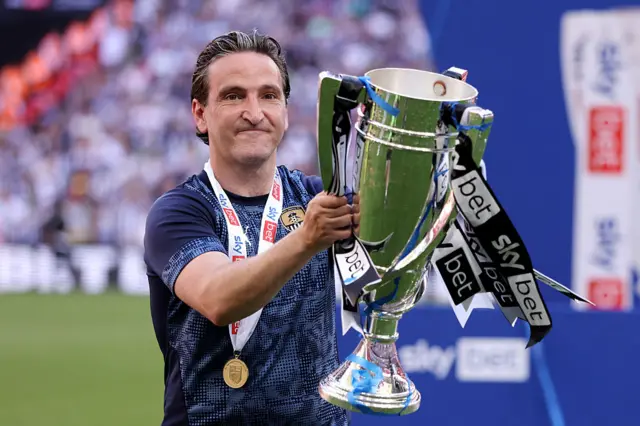 Notts County boss Martin Paterson with the League Two play-off final trophy
