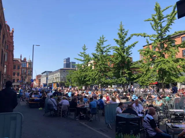 Fans are packing out Stevenson Square in Manchester's Northern Quarter