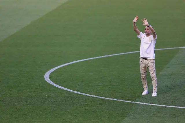 Manchester City manager Pep Guardiola waves goodbye to Manchester City