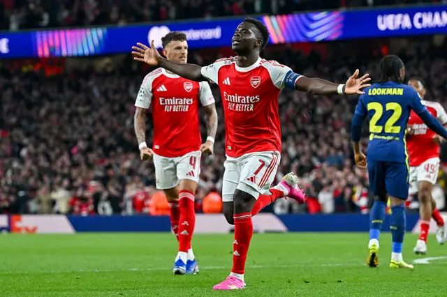 Bukayo Saka celebrates after scoring his team's first goal during the UEFA Champions League 2025/26 Semi Final Second Leg match between Arsenal FC and Atletico de Madrid.
