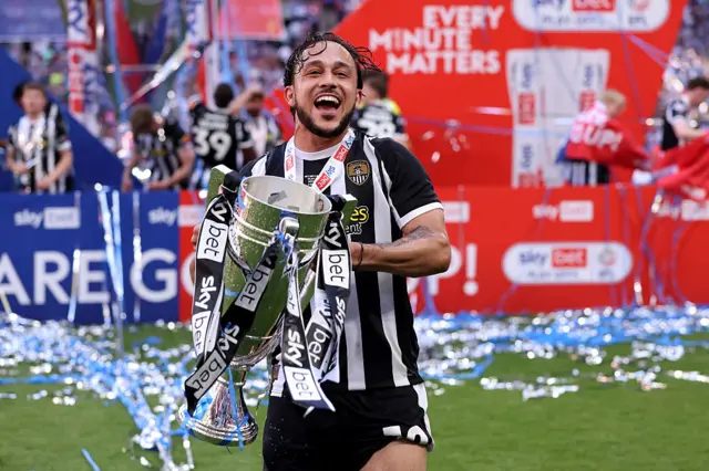 Notts County's Jodi Jones with the League Two play-off final trophy