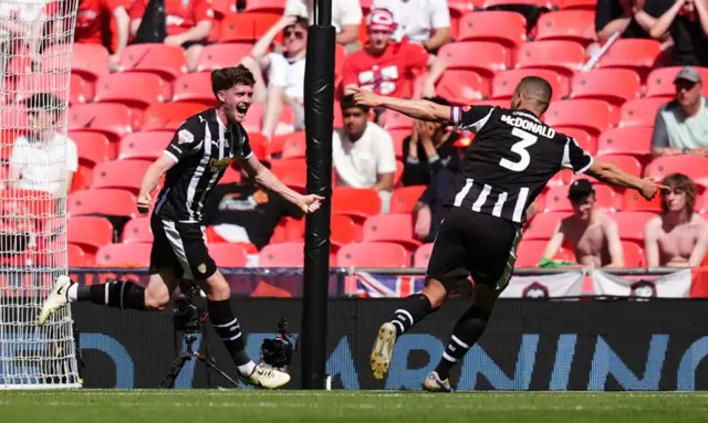 Lucas Ness celebrates scoring Notts County's second goal against Salford City