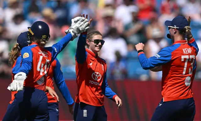 Charlie Dean and England celebrate the wicket of Izzy Gaze