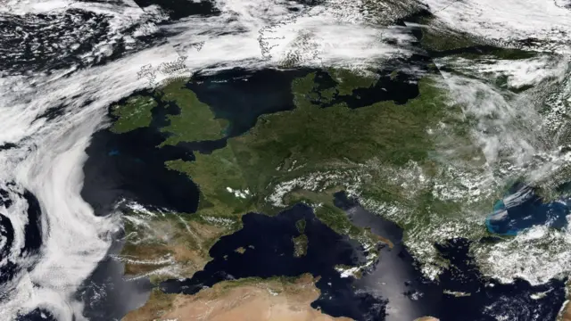 Satellite imagery from Monday shows the clear and hot conditions extended across much of Europe, which was under the same area of high pressure