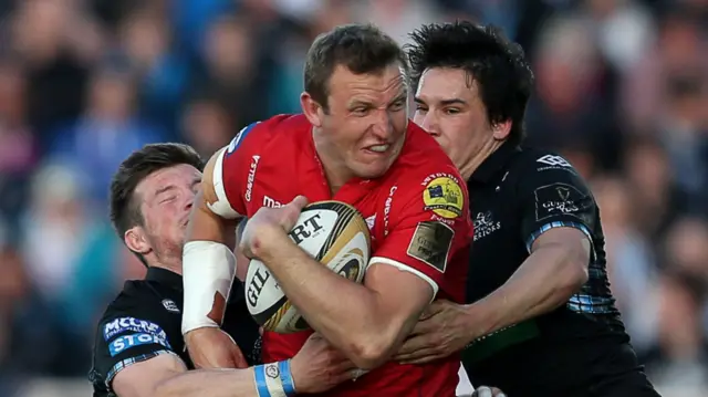 Hadleigh Parkes carries the ball in Scarlets' semi-final win at Glasgow in 2018
