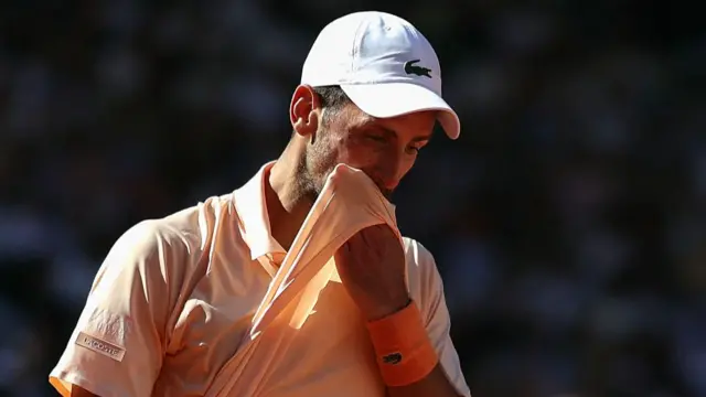 Djokovic reacts