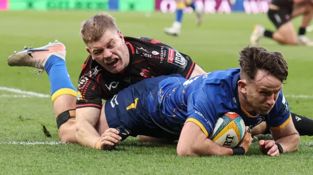 Leinster's Hugo Keenan scores their third try against Lions