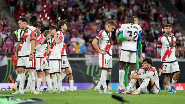Rayo Vallecano players look dejected