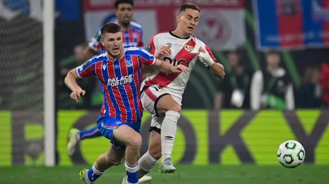 Adam Wharton and Jorge de Frutos vie for the ball