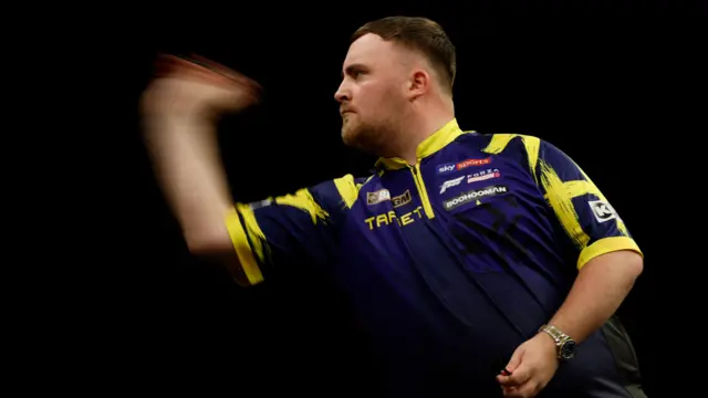 Luke Littler in action during the final match against Luke Humphries