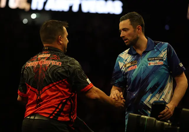 Luke Humphries and Jonny Clayton shake hands