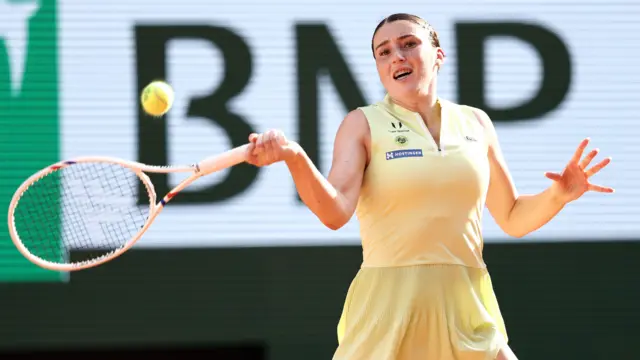 Elsa Jacquemot hits a forehand