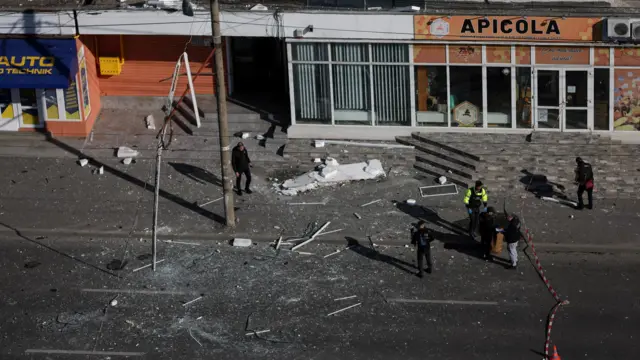 Romanian law enforcement officers work on the site of an explosion at a residential block of flats following a drone hit close to the border with Ukraine, in Galati, Romania, May 29, 2026.