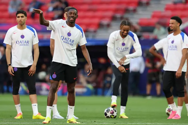 Ousmane Dembele and his teammates take part in a training session