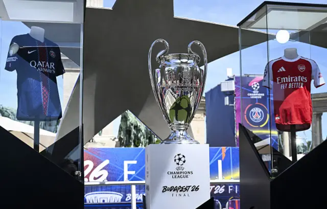 The UEFA Champions League trophy is seen as English football club Arsenal and French side Paris Saint-Germain