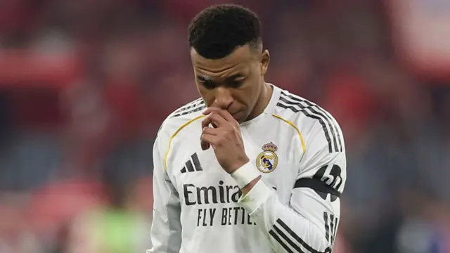 Kylian Mbappe of Real Madrid looks dejected after the team's defeat in the UEFA Champions League 2025/26 Quarter-Final Second Leg match between FC Bayern München and Real Madrid CF