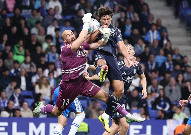 Gonzalo Garcia challenges Espanyol's Serbian goalkeeper #13 Marko Dmitrovic