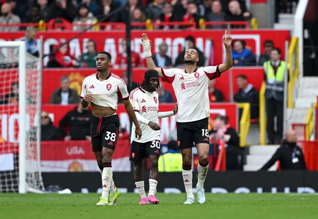 Cody Gakpo of Liverpool celebrates scoring his team's second goal during the Premier League match between Manchester United and Liverpool at Old Trafford on May 03, 2026.