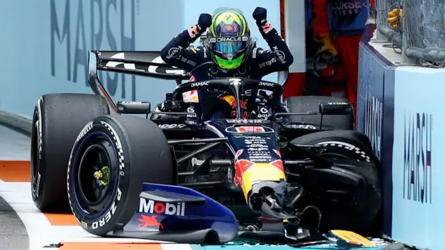 Isack Hadjar climbs out of his crashed car during the F1 Grand Prix of Miami