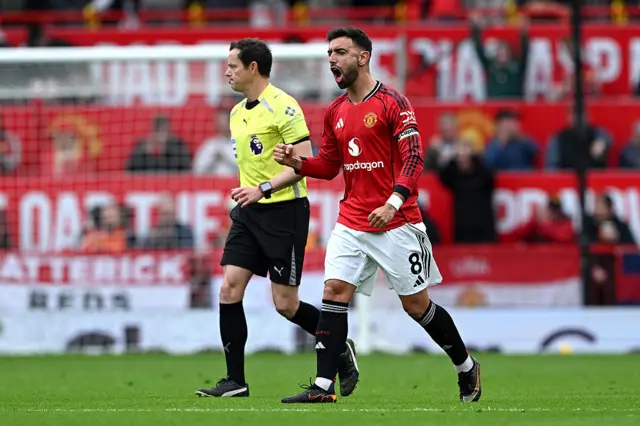 Bruno Fernandes of Manchester United celebrates after VAR confirms a goal scored by Benjamin Sesko of Manchester United (not pictured) stands during the Premier League match between Manchester United and Liverpool at Old Trafford.