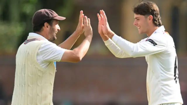 Archie Vaughan celebrates taking wicket