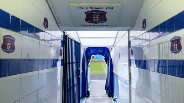 View from the tunnel with the pitch in the distance at Carlisle United's Brunton Park home