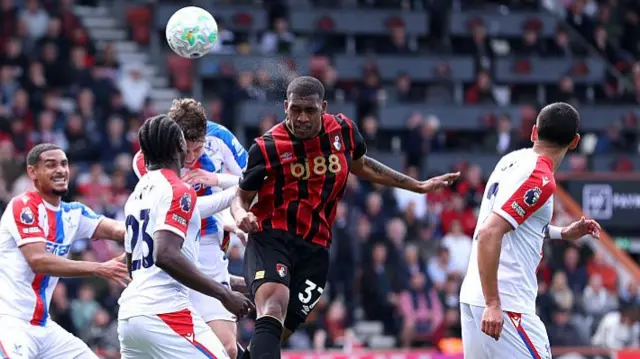Rayan Headers a ball