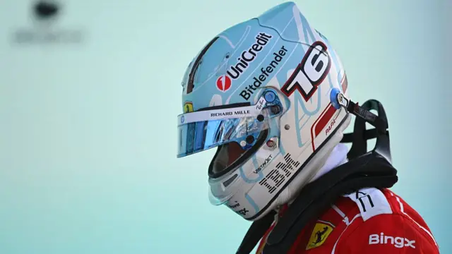 Charles Leclerc with his helmet on