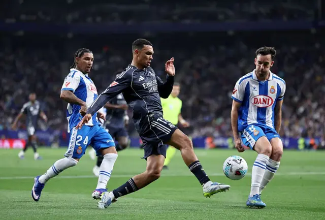English defender #12 Trent Alexander-Arnold fights for the ball with Espanyol's English forward #24 Tyrhys Dolan