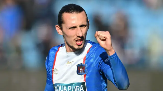 Callum Whelan clenches his first while playing for Carlisle