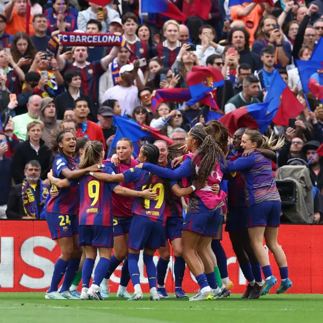 Barcelona players celebrate at full time