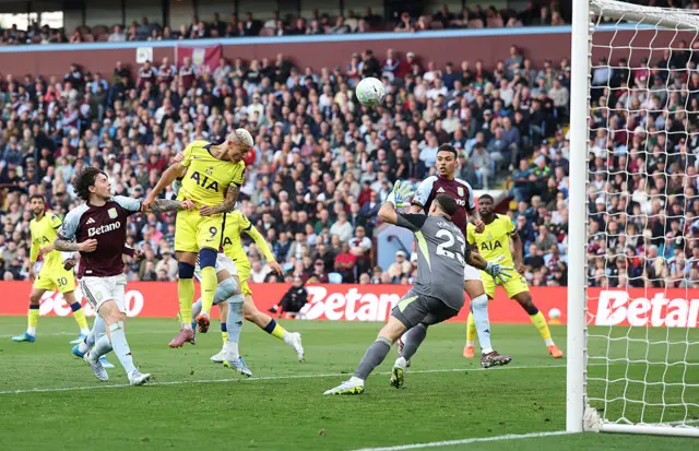 Richarlison heads the ball into the goal